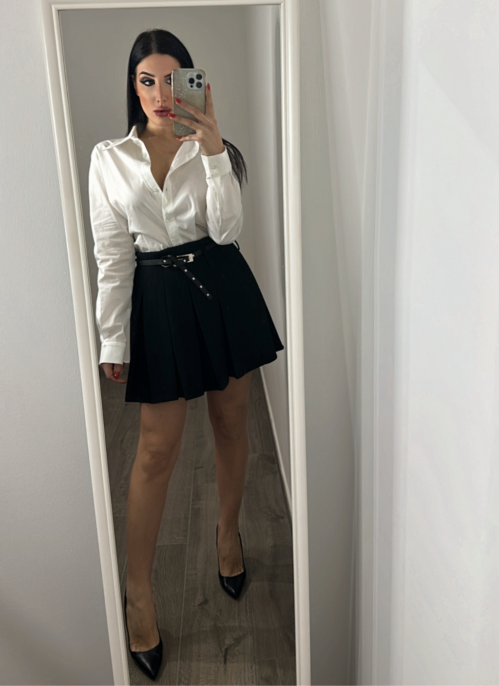 Minigonna a pieghe con cintura