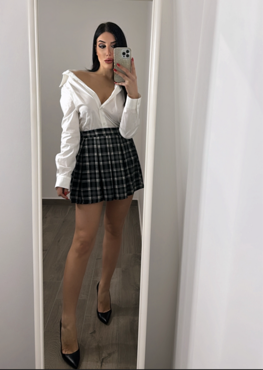 Minigonna a pieghe a quadretti