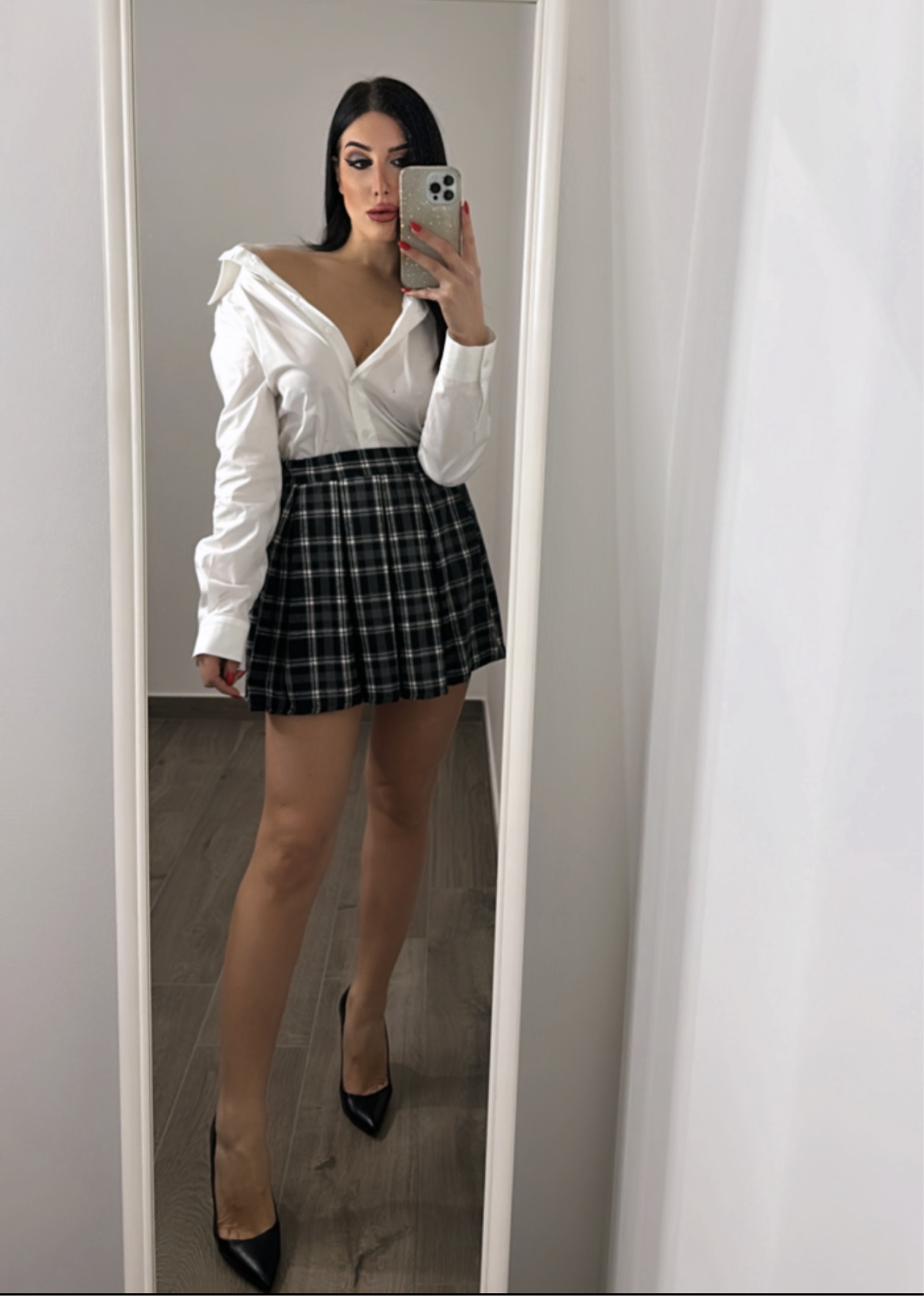 Minigonna a pieghe a quadretti