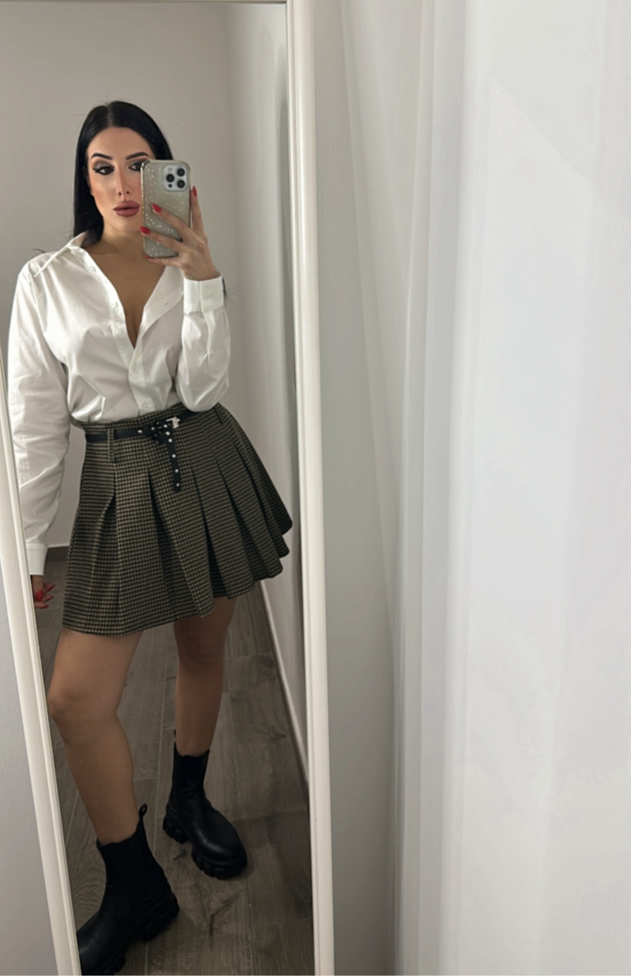 Minigonna a pieghe a quadretti con cintura